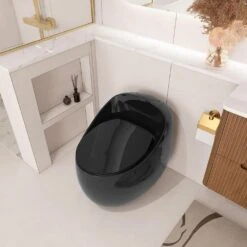 1-Piece 1.28 GPF Single Flush Egg Shape Toilet In Glossy Black -Tahanbath black tahanbath one piece toilets z w2973p301480 44 1000
