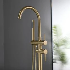Single-Handle Freestanding Waterfall Tub Filler Bathroom Tub Faucet With Handheld Shower In Brushed Gold -Tahanbath brushed gold claw foot tub faucets q xy hs117 77ng 04 4f 1000