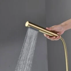 Single-Handle Freestanding Waterfall Tub Filler Bathroom Tub Faucet With Handheld Shower In Brushed Gold -Tahanbath brushed gold claw foot tub faucets q xy hs117 77ng 04 fa 1000