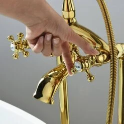 3-Handle Freestanding Swivel Spout Foot Tub Faucet With Hand Shower In Brushed Gold 13 3-Handle Freestanding Swivel Spout Foot Tub Faucet With Hand Shower In Brushed Gold -Tahanbath brushed gold claw foot tub faucets q ybs 7001y bg 1f 1000
