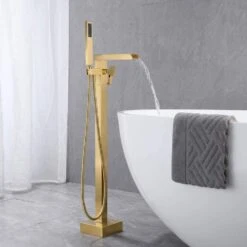 1-Handle Swivel Spout Freestanding Waterfall Tub Filler With Hand Shower In Brushed Gold -Tahanbath brushed gold claw foot tub faucets w122453939 kxc fa 1000