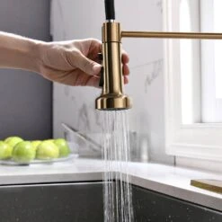 Single Handle Deck Mount Gooseneck Pull Out Sprayer Kitchen Faucet With Deckplate Included In Brushed Gold -Tahanbath brushed gold pull out kitchen faucets ct 289ng 1p kxc 1f 1000