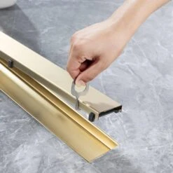 2.75 In. W X 36 In. D Stainless Steel Decorative Drain Cover With Brushed Gold -Tahanbath brushed gold shower drains q pzz 7001lsj 36 fa 1000