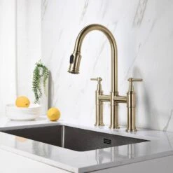 Single Handle Bridge Kitchen Faucet With Pull-Down Sprayhead In Spot In Matte Gold -Tahanbath brushed gold tahanbath bridge kitchen faucets y w92850227 1f 1000