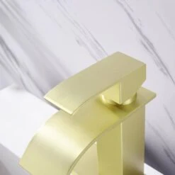 Single Hole Waterfall Spout Bathroom Faucet, Single Handle Bathroom Vanity Sink Faucet In Brushed Gold 12 Single Hole Waterfall Spout Bathroom Faucet, Single Handle Bathroom Vanity Sink Faucet In Brushed Gold -Tahanbath brushed gold tahanbath single hole bathroom faucets y w928 103318 fa 1000