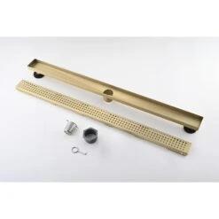 36 In. Linear Shower Drain, Included Hair Strainer And Leveling Feet In Brushed Gold 12 36 In. Linear Shower Drain, Included Hair Strainer And Leveling Feet In Brushed Gold -Tahanbath brushed gold tahanbath sink strainers y w2287 p151592 fa 1000
