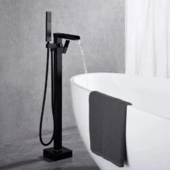 1-Handle Swivel Spout Freestanding Waterfall Tub Filler With Hand Shower In Matte Black -Tahanbath matte black claw foot tub faucets w122453938 kxc fa 1000